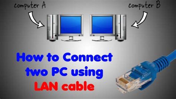 How can I connect two computers with LAN cable in Windows XP?