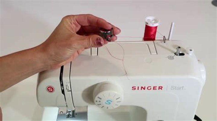 Why is my Singer sewing machine not threading?